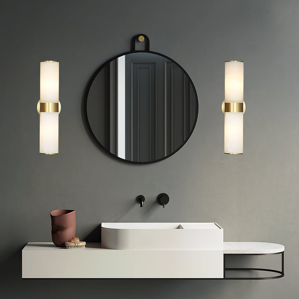 Clérachic Sway fitted in pairs either side of a round black mirror on a deep green bathroom wall.