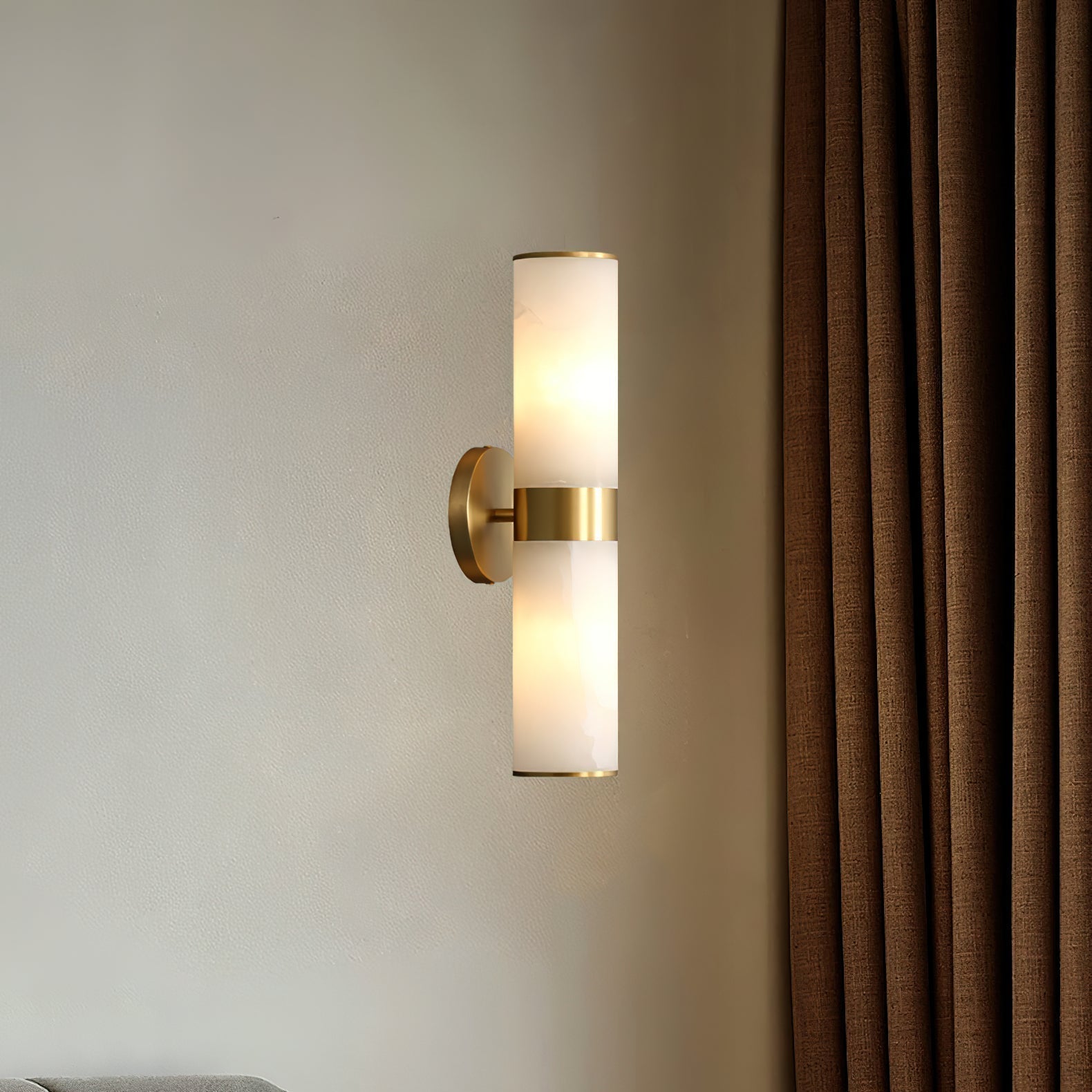 Clérachic Sway glowing on a cream bedroom wall beside full length rust coloured curtains.