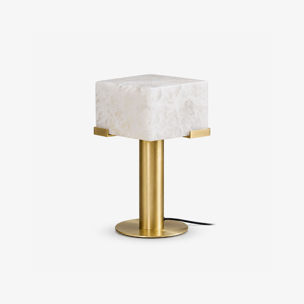 Cutout view of this Clérachic table lamp in brass, its alabaster block shade held by slim bracket clips.