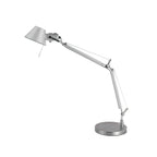 Clérachic chrome desk lamp on a white backdrop, with its arm raised and a round base with a pull cord on the shade.