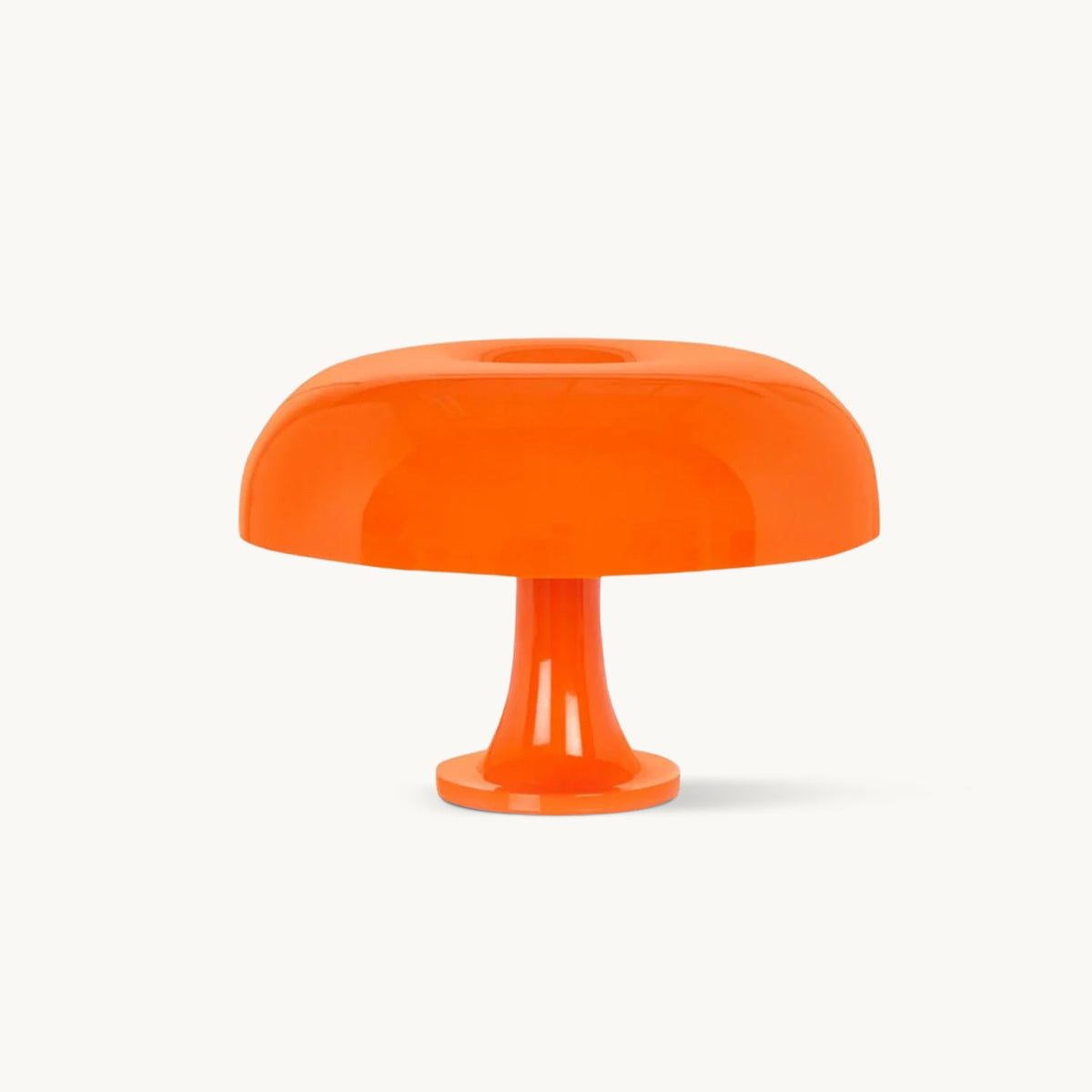 Orange mushroom-shaped table lamp from Clérachic on a plain white backdrop, its glossy dome shade sitting on a flared stem.