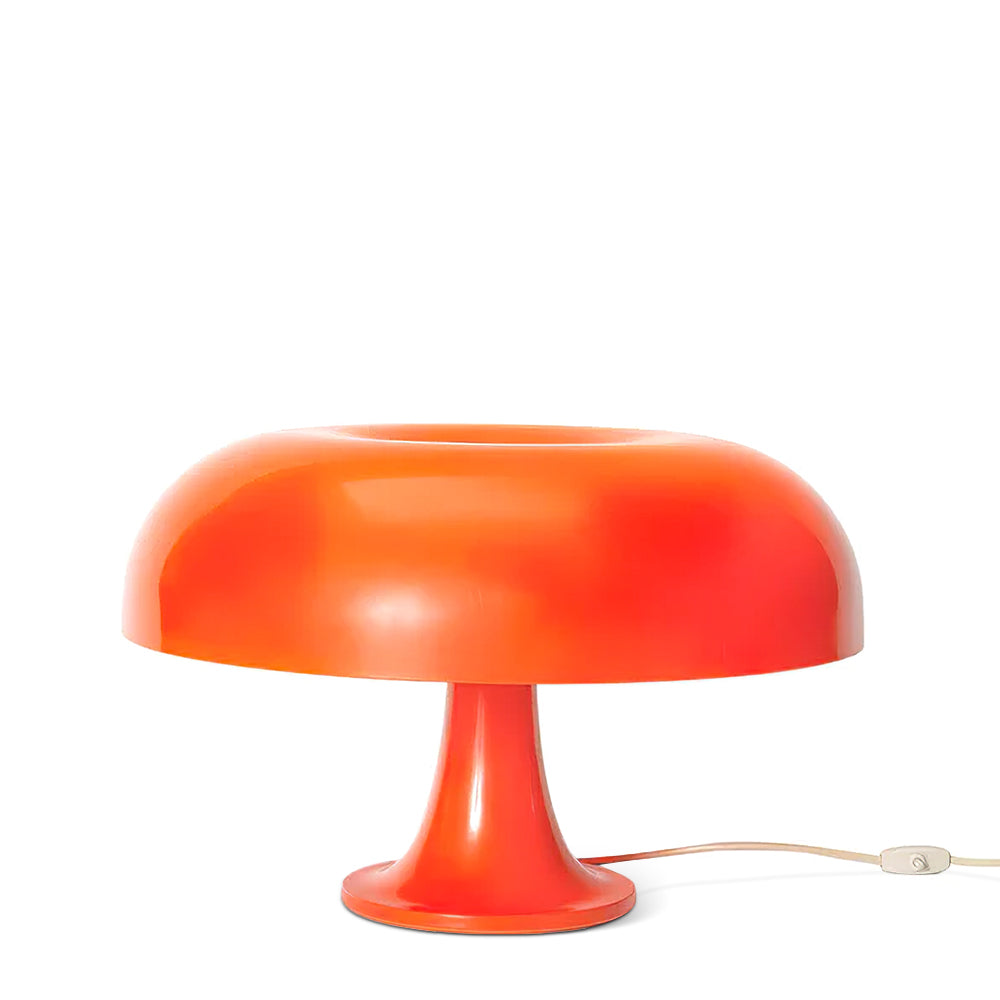 Orange Clérachic dome lamp on a white backdrop, shown from the side with its pale cord and in-line switch.