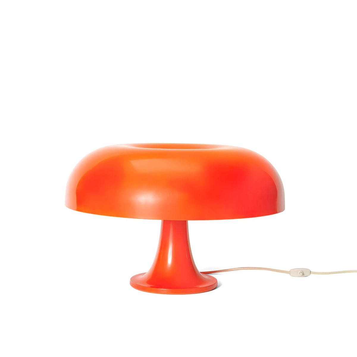 Orange Clérachic mushroom table lamp on a plain white backdrop, with its cord and in-line switch visible on the right.