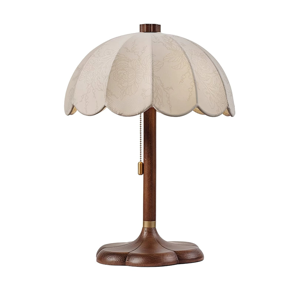 Clérachic table lamp with a walnut-coloured stem, brass collar and pull chain, cut out on a plain white backdrop.