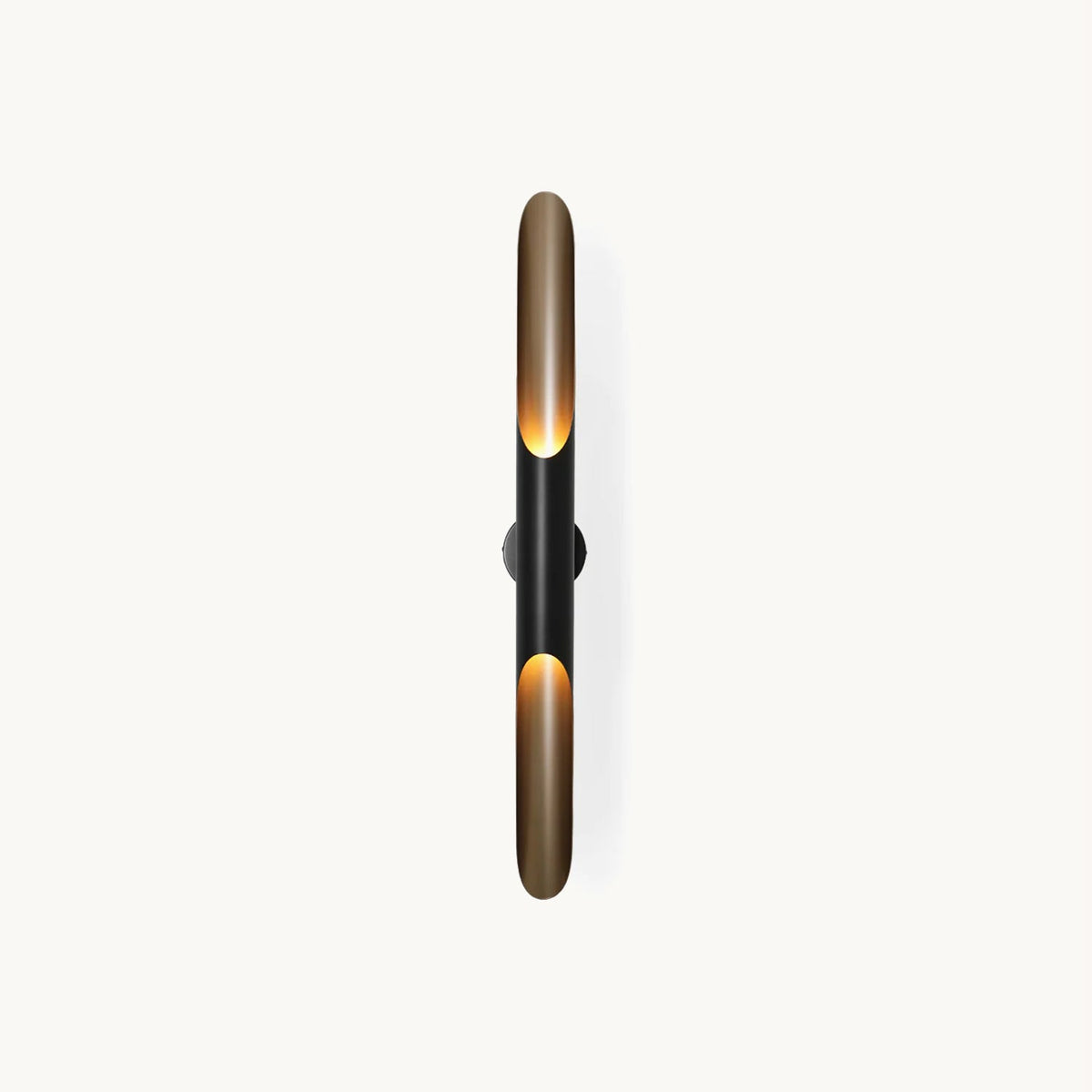 A tall slim wall light on a plain white backdrop: two matt black and gold tubes with open, angled mouths, from Clérachic.
