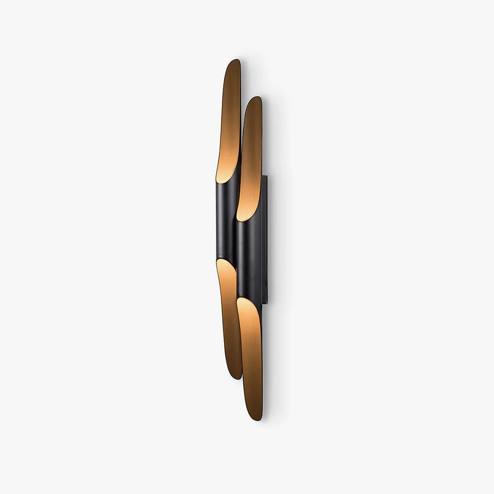 A staggered double-tube version of this Clérachic wall light, with black tubes and gold-lined openings, on a pale backdrop.