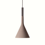 A Clérachic pendant in a brown concrete finish with a slight mauve tone, on white, under a black collar.