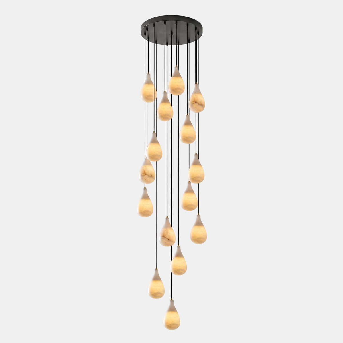 A tall cascade of lit alabaster drops hangs at staggered heights from a round black canopy on this Clérachic pendant.