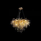 The Clérachic teardrop chandelier on black at a wider size, drops falling in a deeper curtain.