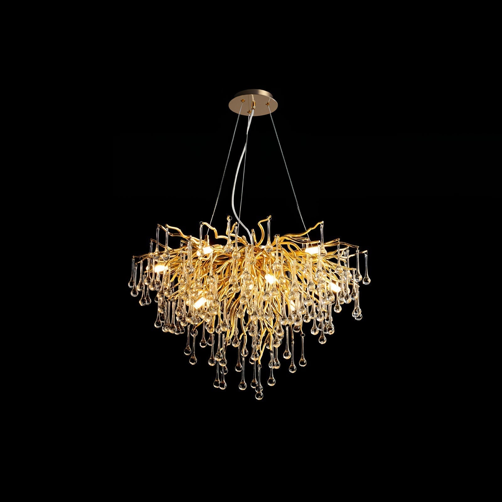 The Clérachic teardrop chandelier on black at a wider size, drops falling in a deeper curtain.