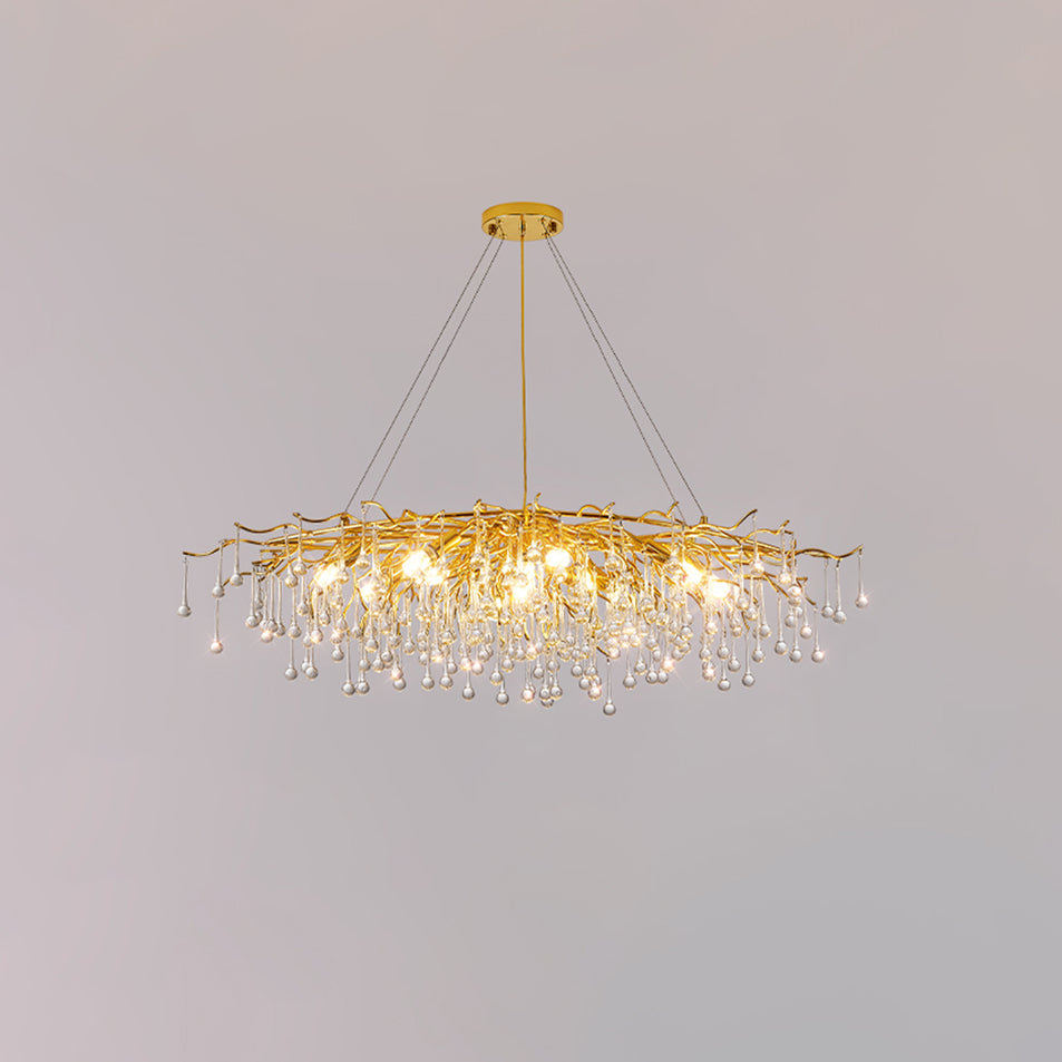 Clérachic teardrop chandelier on pale grey, a long oval frame hung on fine cables.