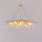 Clérachic teardrop chandelier on grey at its widest, glass drops running the full span.