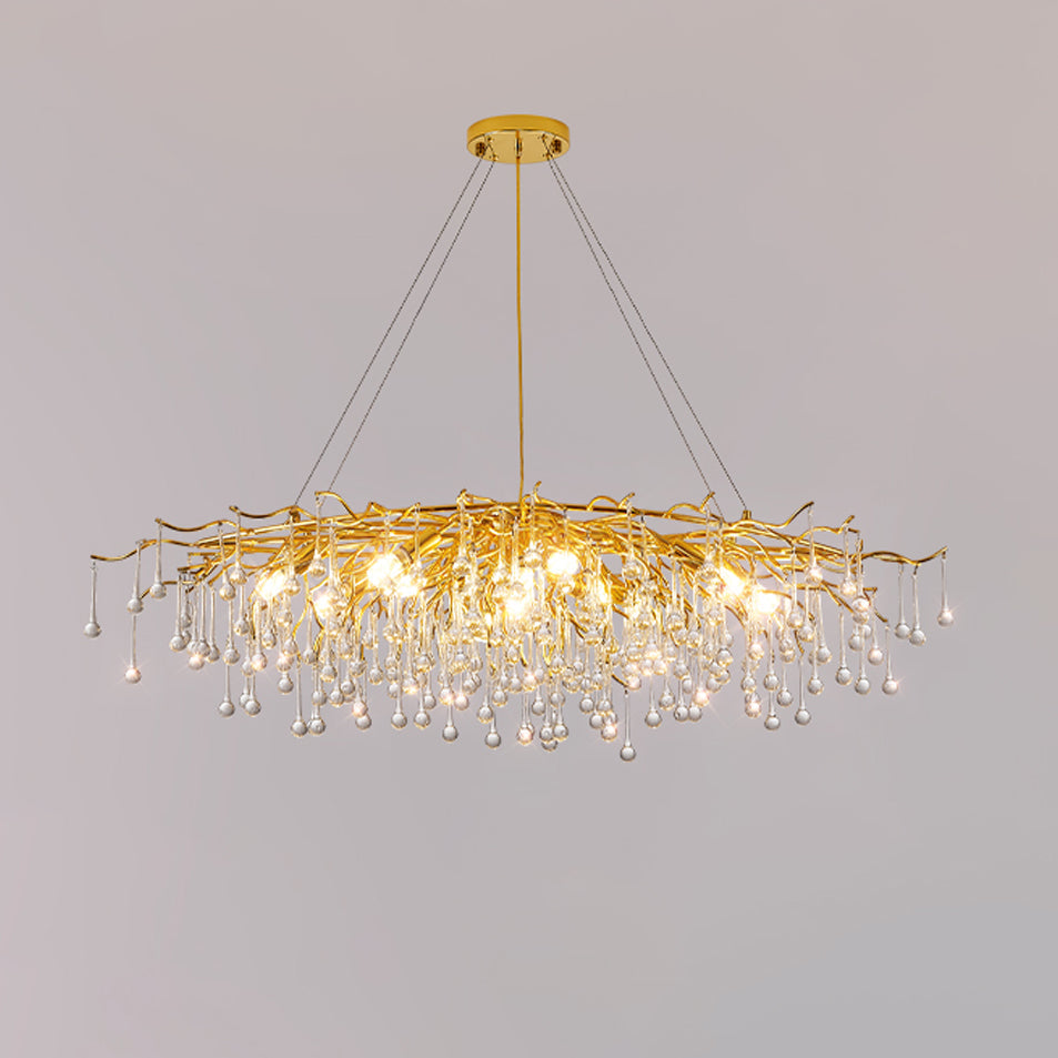 Clérachic teardrop chandelier on grey at its widest, glass drops running the full span.