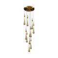 Clérachic Teardrop Crystal Chandelier in the 10-light cluster, gold caps on seeded glass drops against white.