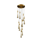 Clérachic Teardrop Crystal Chandelier in the 10-light cluster, gold caps on seeded glass drops against white.