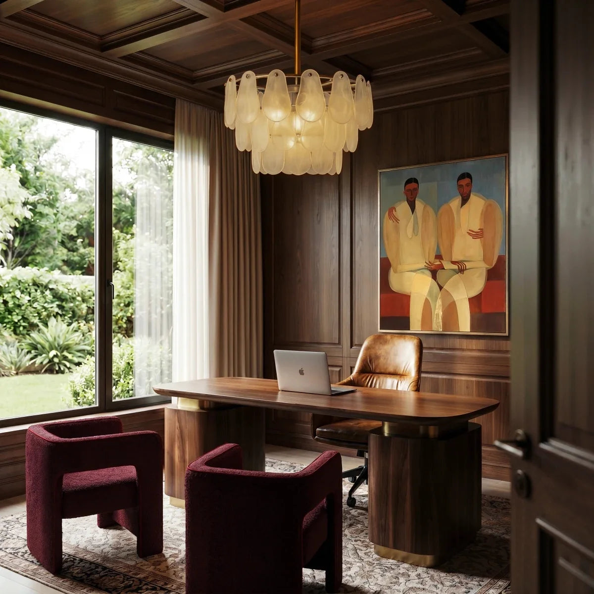 Clérachic round chandelier with frosted glass teardrop tiers above a walnut desk in a wood-panelled study.