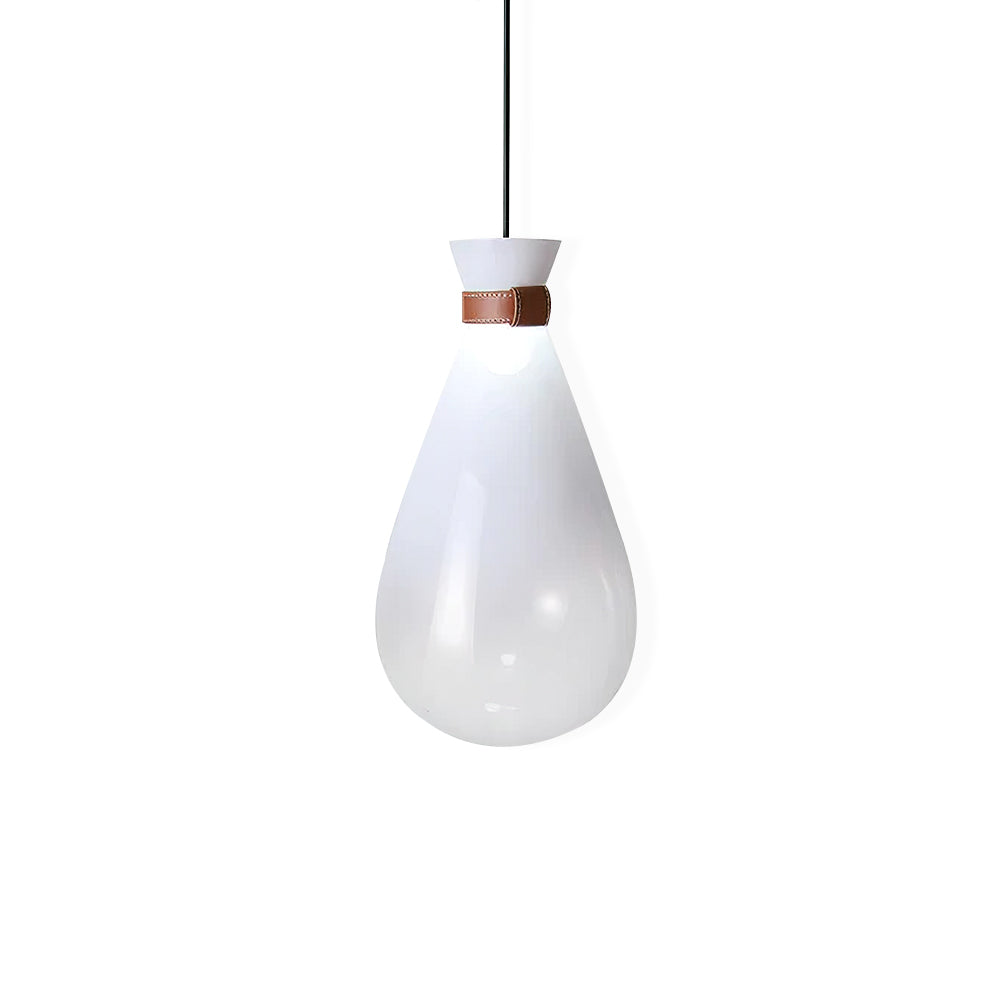 White Clérachic teardrop pendant on a plain white backdrop, with a tan leather strap and a white collar at the neck.