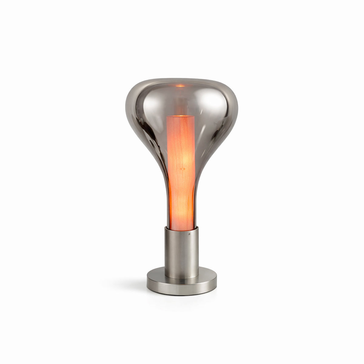 On white, a smoke-grey teardrop lamp with an orange glowing core stands on a round chrome base, from Clérachic.