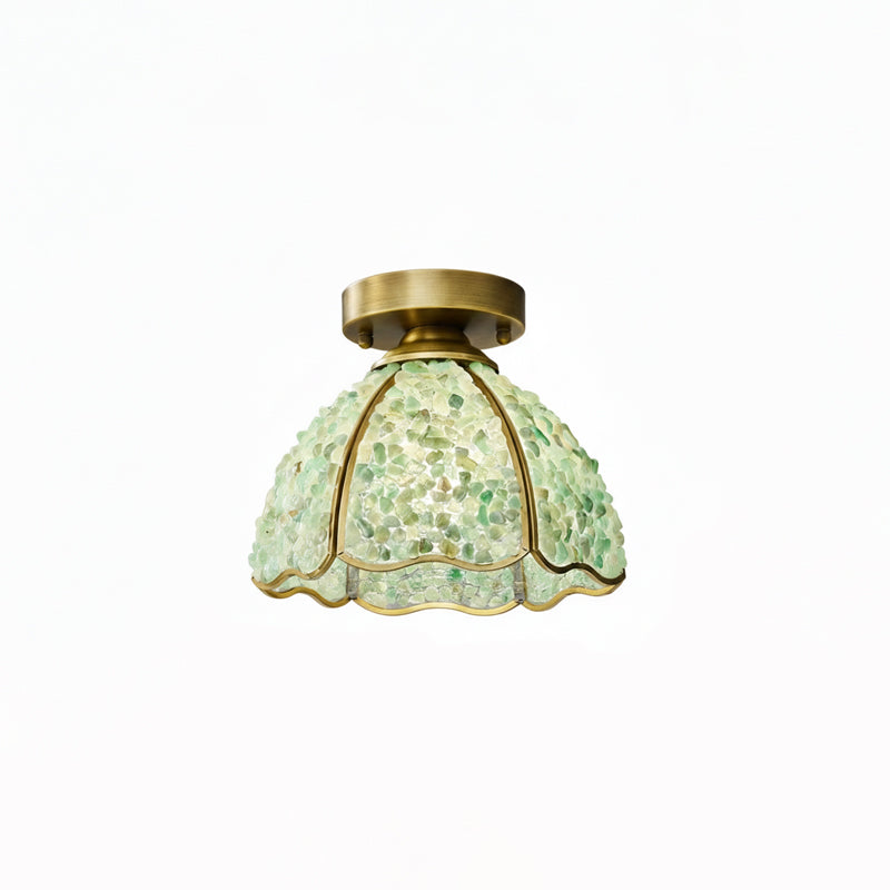 Green pebble-glass shade with a short brass stem and round canopy, this Clérachic flush light shown on a white background.