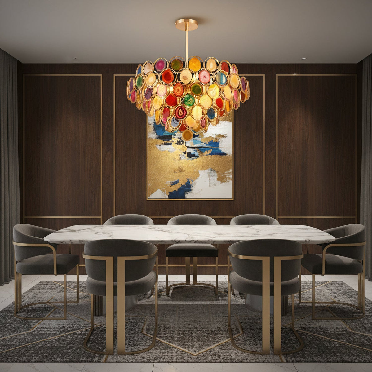 A Clérachic agate chandelier hanging over a marble dining table with grey chairs, in a room with dark wood panelling.