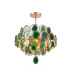 A Clérachic agate chandelier on white, its slices in shades of green with a green pendant slice below.