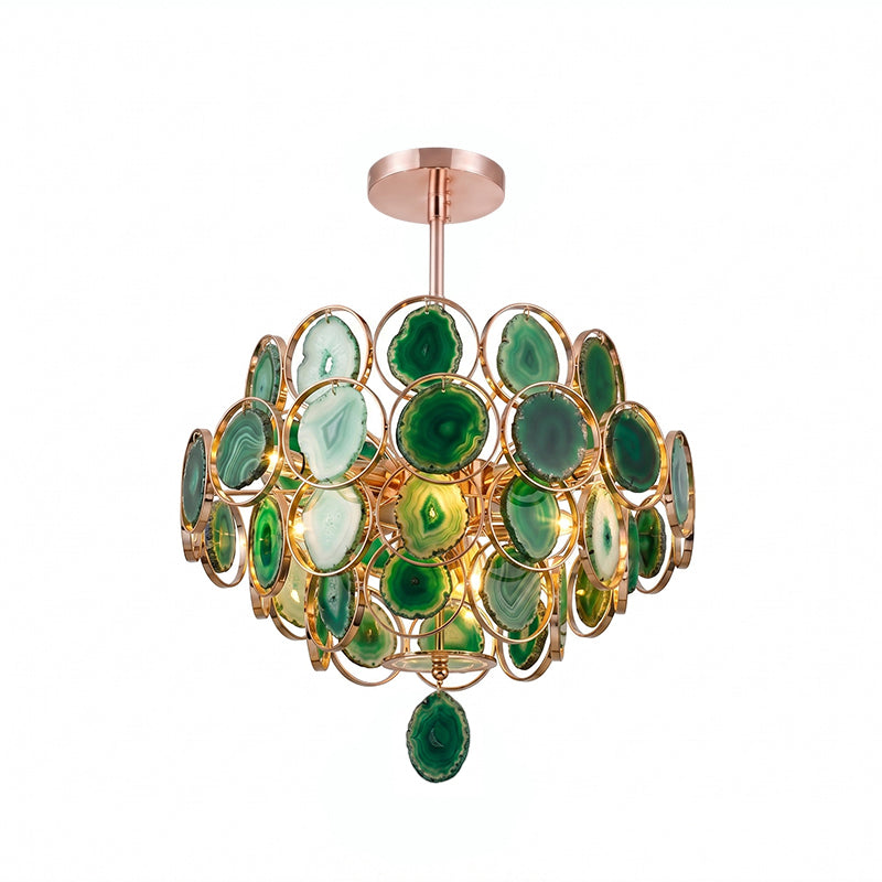 A Clérachic agate chandelier on white, its slices in shades of green with a green pendant slice below.