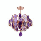 A Clérachic agate chandelier on white, its slices in purple and lilac with a purple pendant slice below.
