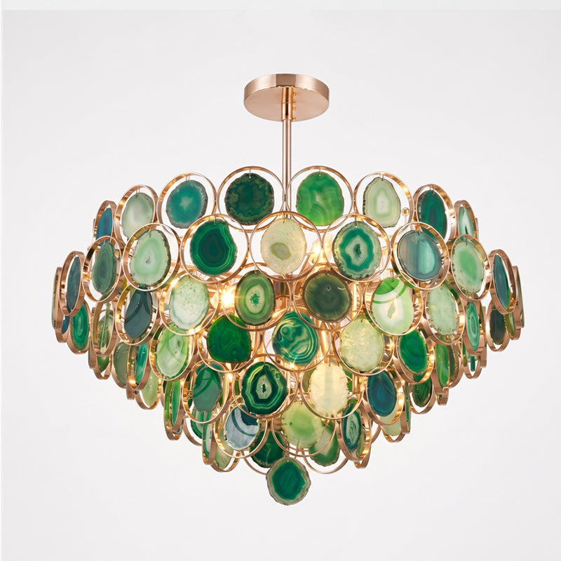 A large Clérachic agate chandelier in green stone slices, with layered tiers and a green slice hanging at the tip.