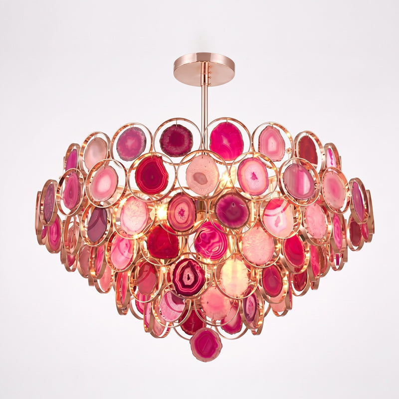 Large pink Clérachic agate chandelier on a pale background, its tiers ranging from blush to deep raspberry.
