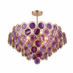 A large Clérachic agate chandelier in purple stone slices, with striped banding on a rose-gold frame.