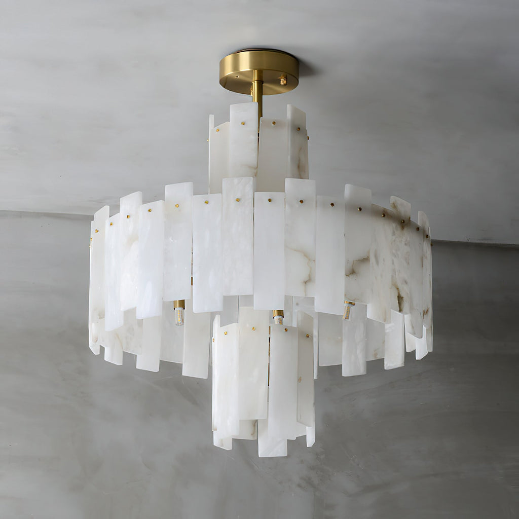 Angled view of the Clérachic Tiered Alabaster Chandelier, brass studs pinning each alabaster slab to the frame.