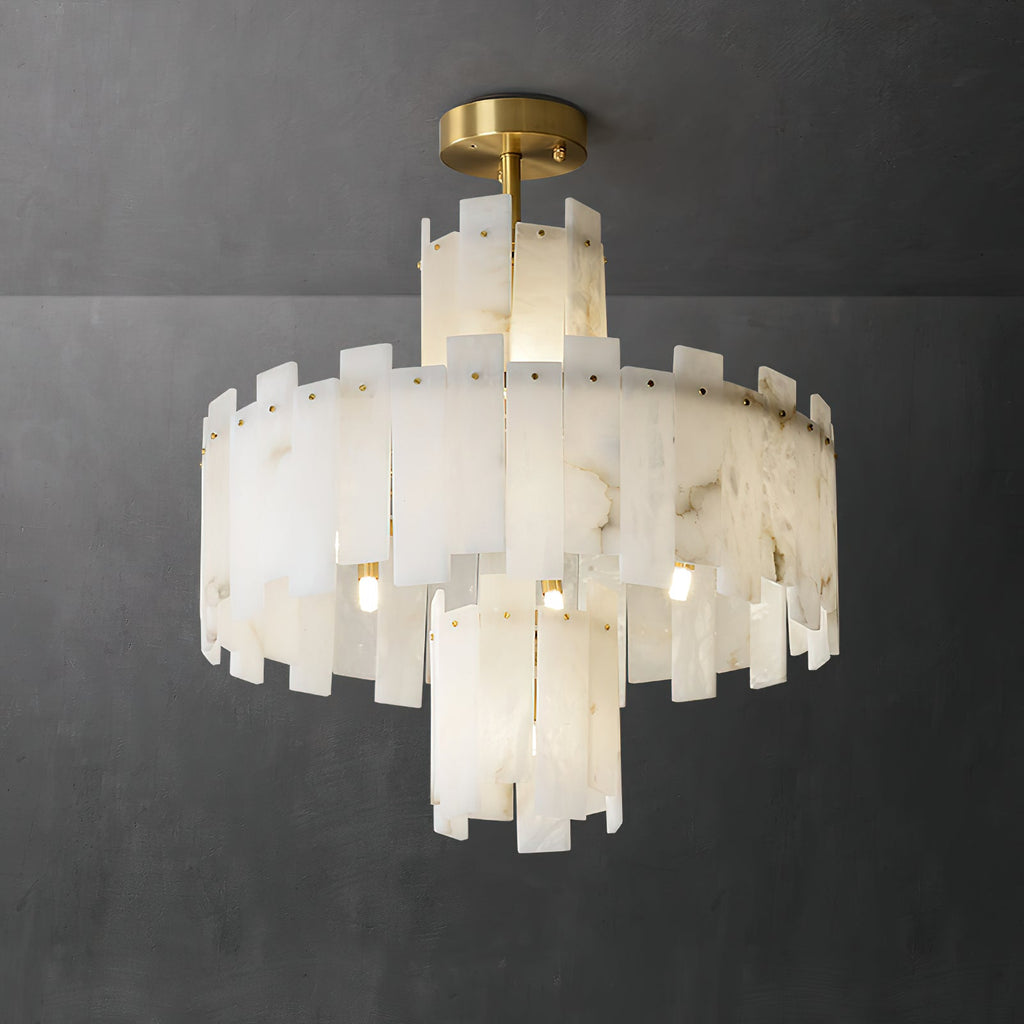 Clérachic Tiered Alabaster Chandelier lit against a charcoal wall, the veining in each slab showing through the light.