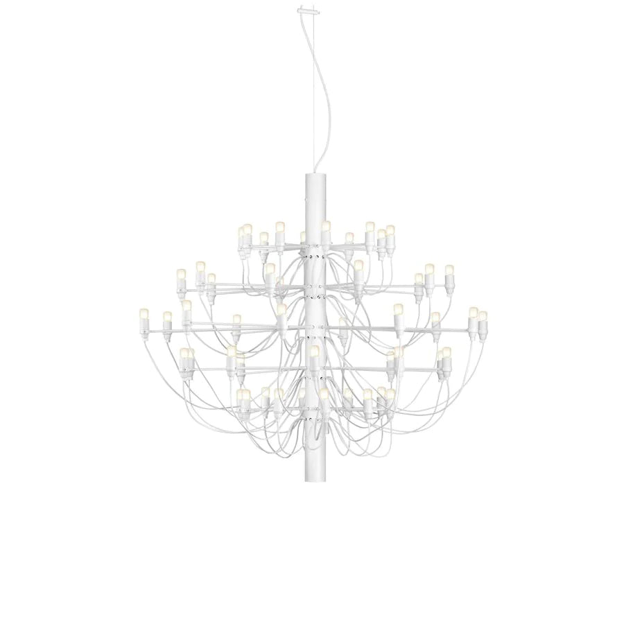 A large Clérachic chandelier in matt white with fine arms and bulbs, hanging on a white backdrop.