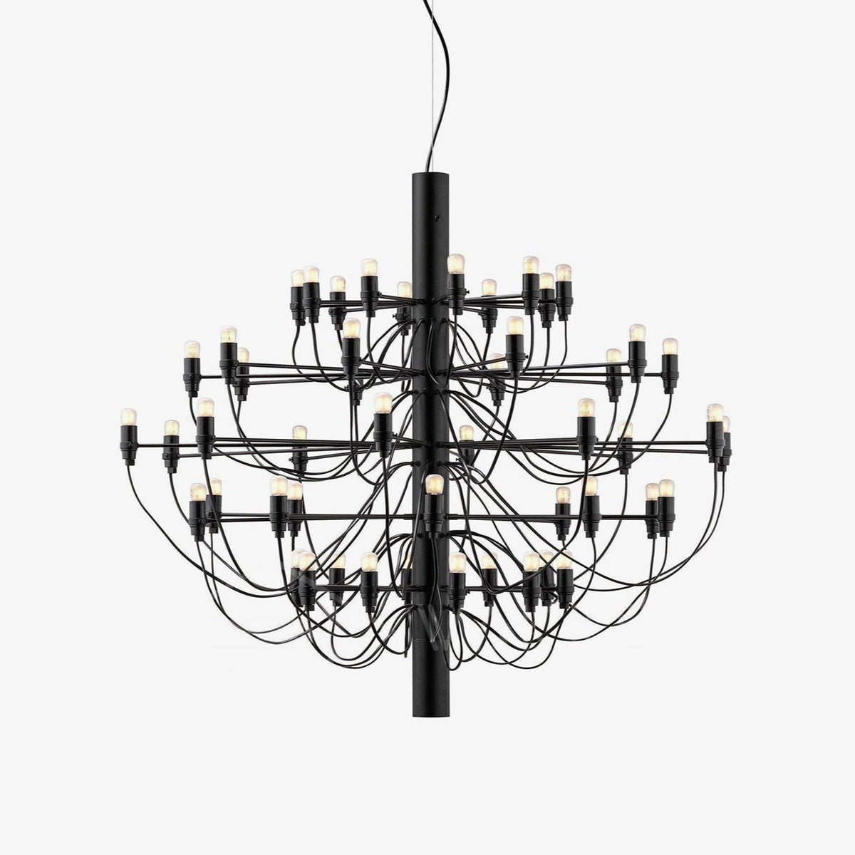 A Clérachic tiered chandelier in matt black, with slim arms and exposed bulbs around a central stem, on a plain white backdrop.