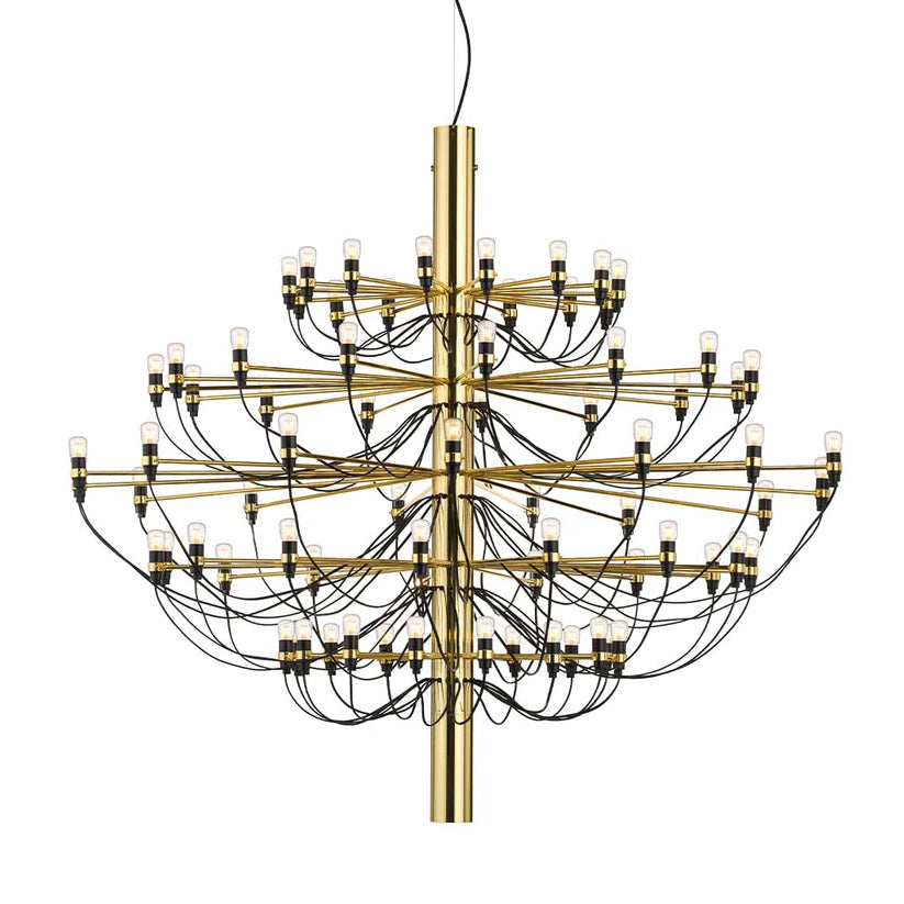 A large Clérachic chandelier with a gold stem, many tiers of slim arms and exposed bulbs, shown on a plain white backdrop.