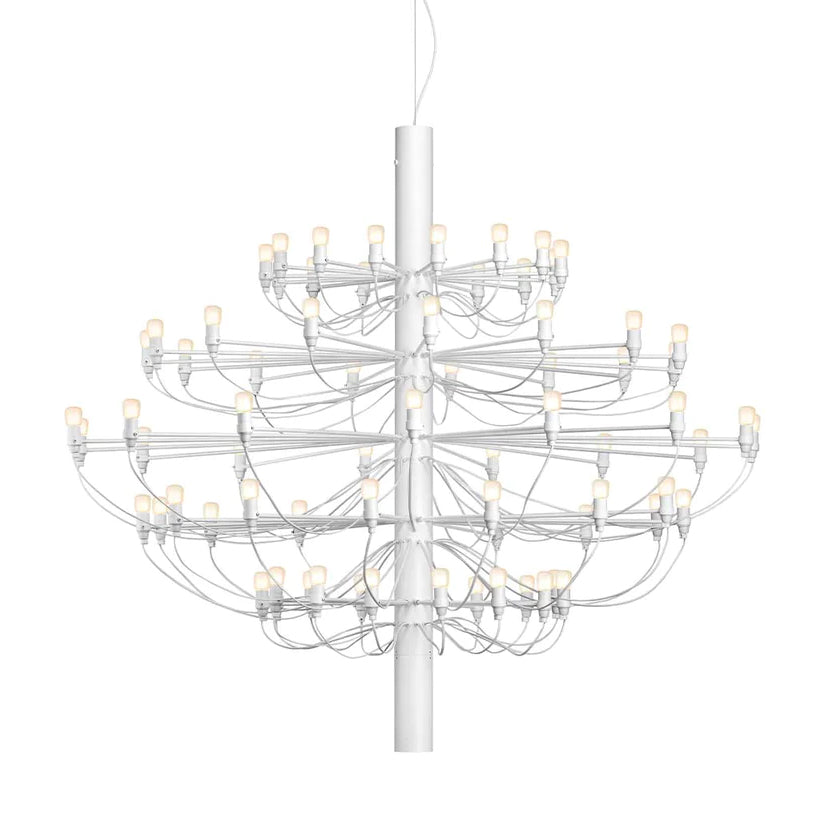 A large Clérachic chandelier in matt white, with several tiers of slim arms and exposed bulbs, on a white backdrop.