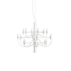 A small two-tier Clérachic chandelier in matt white, its arms and cables pale against a white backdrop.