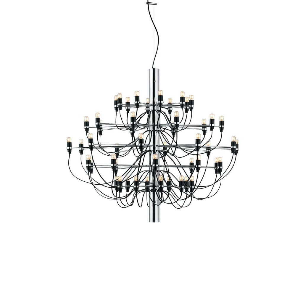 A Clérachic chandelier with a chrome stem, many tiers of slim arms and a ceiling hook above, on a white backdrop.