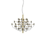 A mid-size Clérachic chandelier with a gold stem, slim arms and exposed bulbs, on a plain white backdrop.