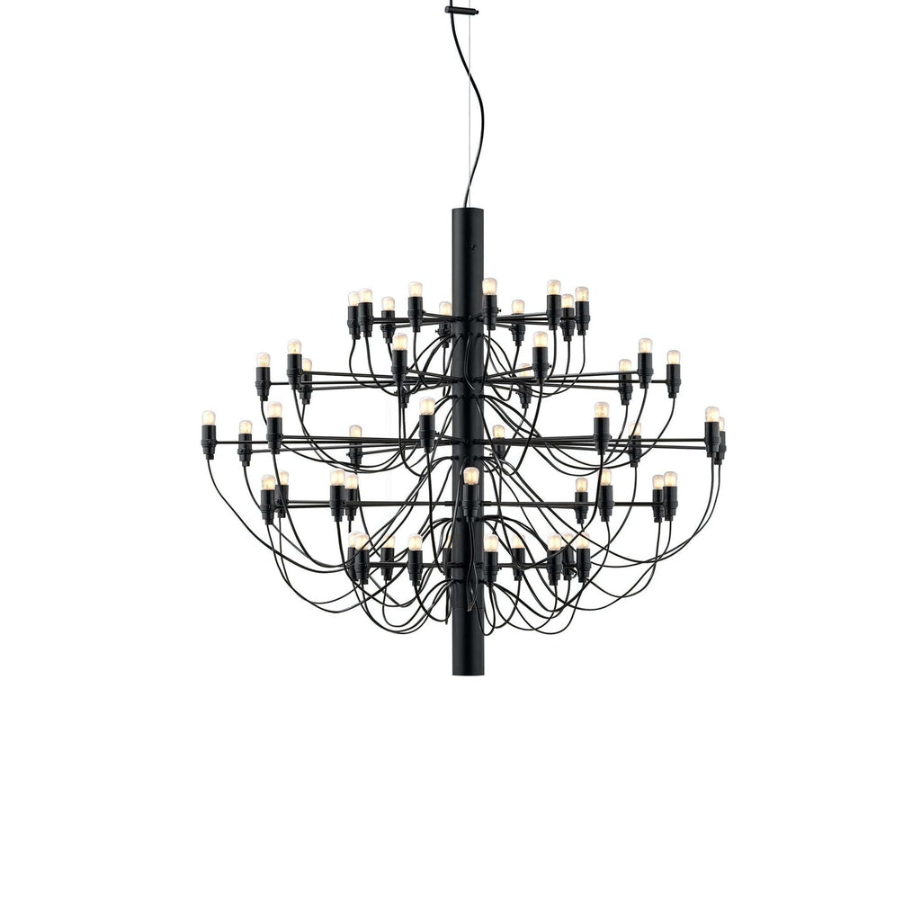 A mid-size Clérachic chandelier in matt black, with curving cable arms and exposed bulbs, on a plain white backdrop.