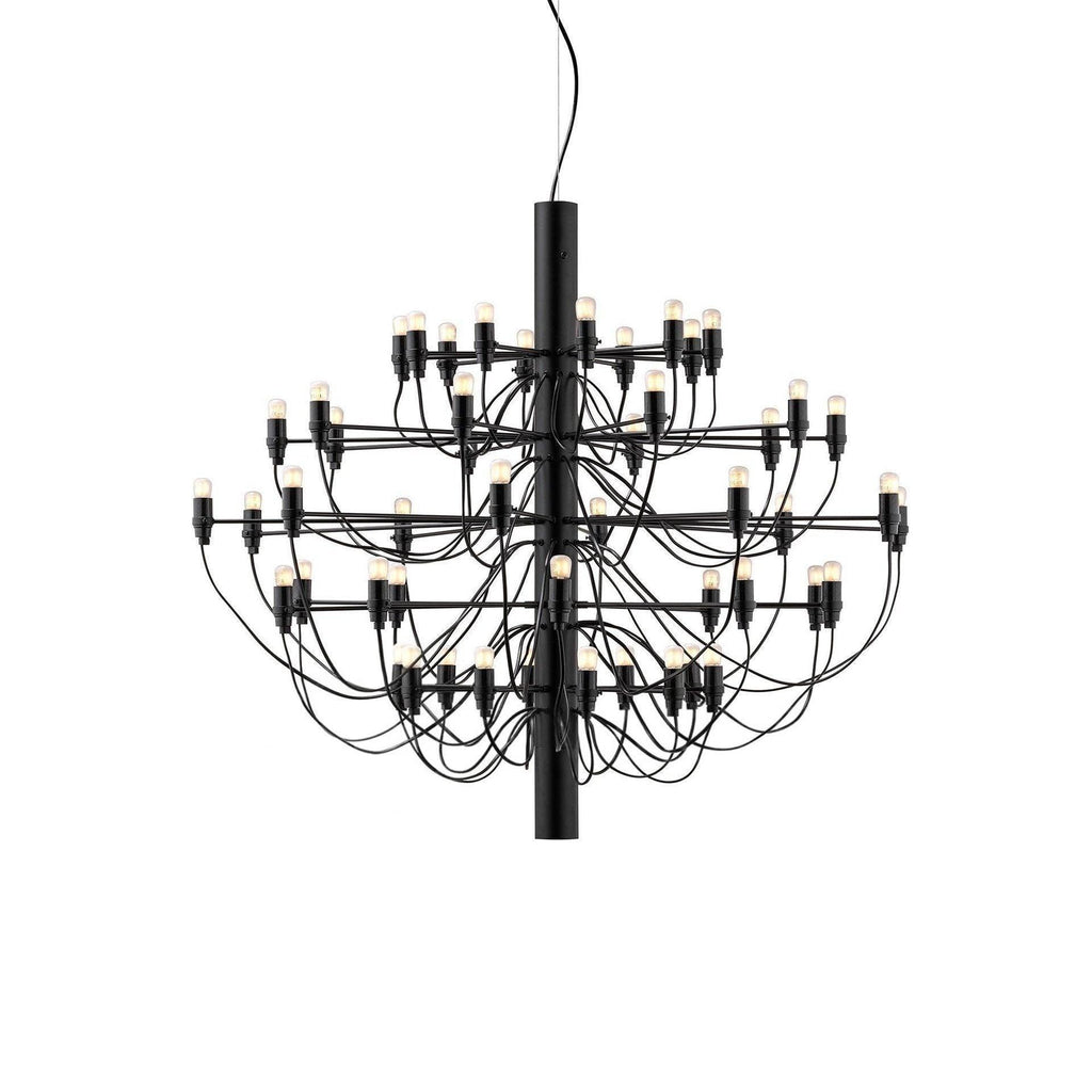 A fuller Clérachic tiered chandelier in matt black, with more arms and bulbs than the compact version, on a white backdrop.