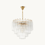Tiered clear glass rod chandelier from Clérachic with a gold-toned frame and chain, shown on a plain white backdrop.