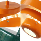 Collage of close views of an orange Clérachic pendant: the top disc, the stepped tiers, a small brass screw and the glowing opening.