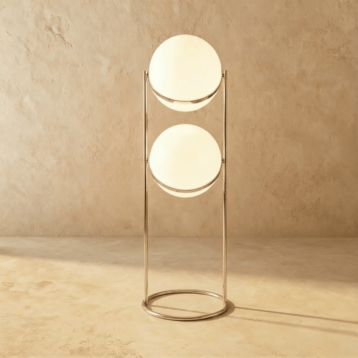 Clérachic two-globe sphere lamp in silver on the taller column, the uprights running well below the lower globe to the ring base.