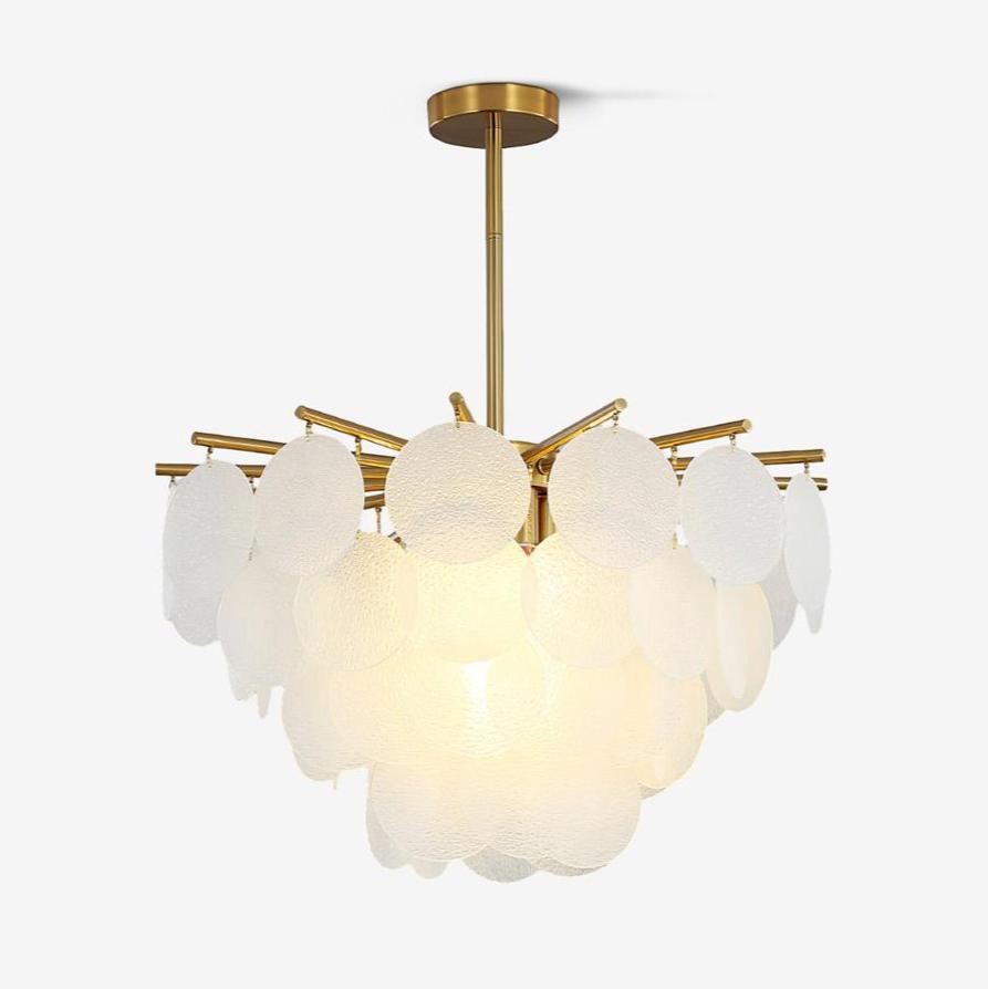 Tiered frosted glass disc chandelier from Clérachic on a short brass-toned rod, lit warmly, on a plain white backdrop.