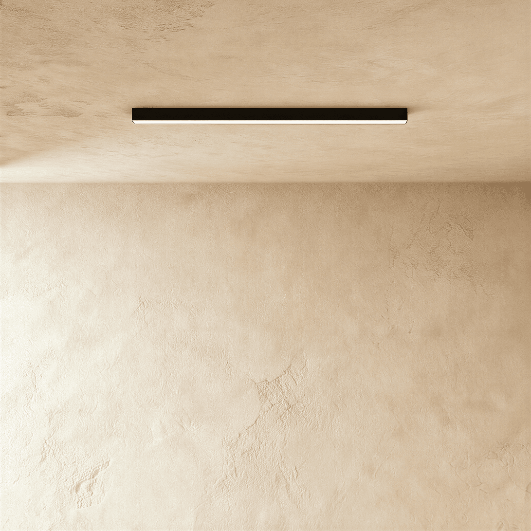 Clérachic linear light head in black, a thin line of light running the length of its lower edge.