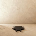 Clérachic track connector in black, a flat piece with a third branch carrying two pin terminals.