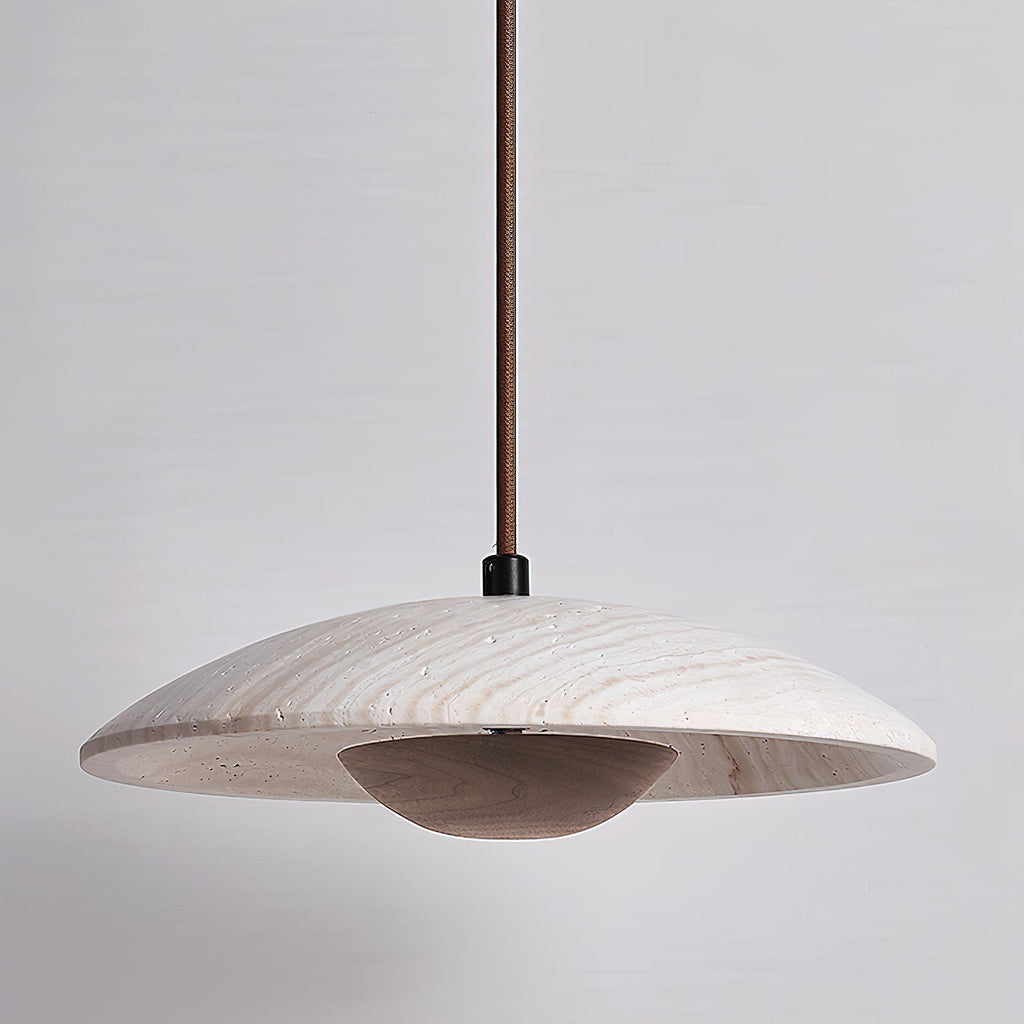 Clérachic pendant with a travertine shade and a dark walnut-toned bowl, shown unlit against a soft grey wall.