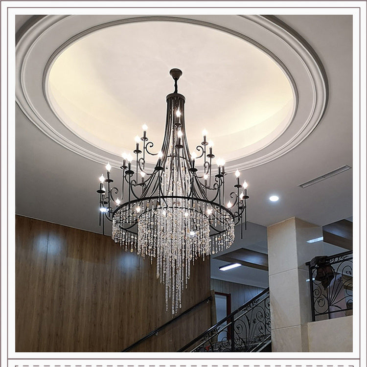 Clérachic Trove in black set into a domed ceiling recess above a stone staircase hall.