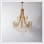 The Clérachic Trove in brass in a taller proportion, the alabaster cascade narrowing to a fine point.